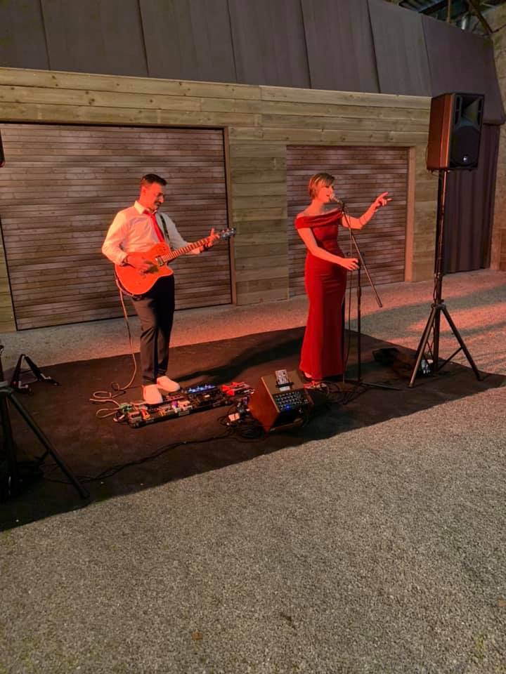 Jenny & David bringing live acoustic vibes to an evening show